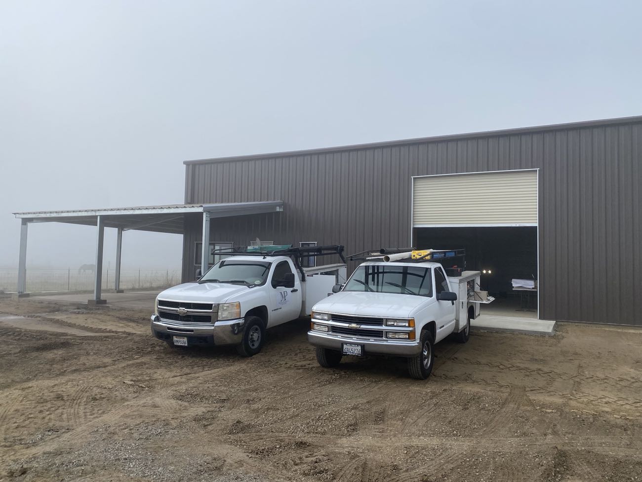 Martinez Plumbing trucks and shop
